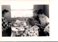 Restall family in their Oak Island home (12x12 construction shack)