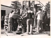 Blankenship being lowered in while Janie looks worried